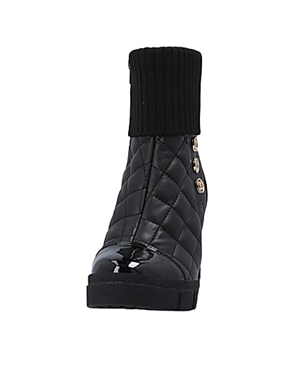 360 degree animation of product Black quilted heeled ankle boot frame-22