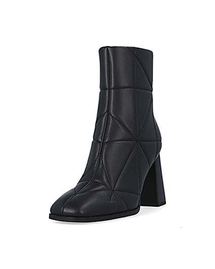360 degree animation of product Black quilted heeled ankle boots frame-23
