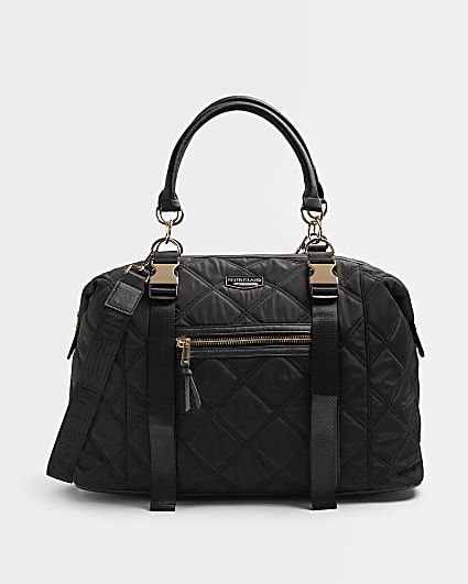 Black quilted holdall bag