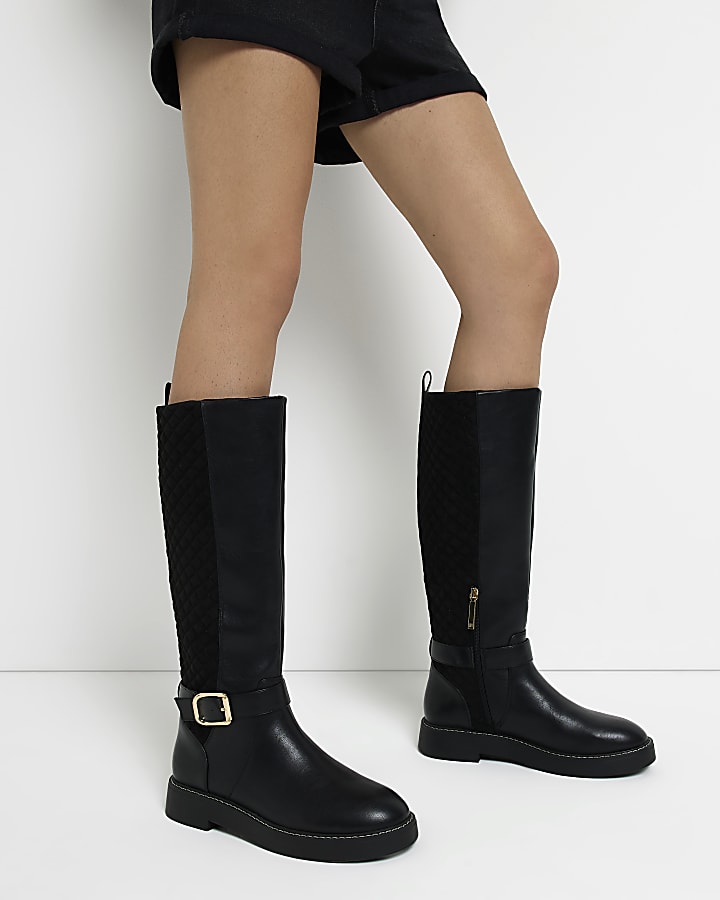 Black quilted knee high boots