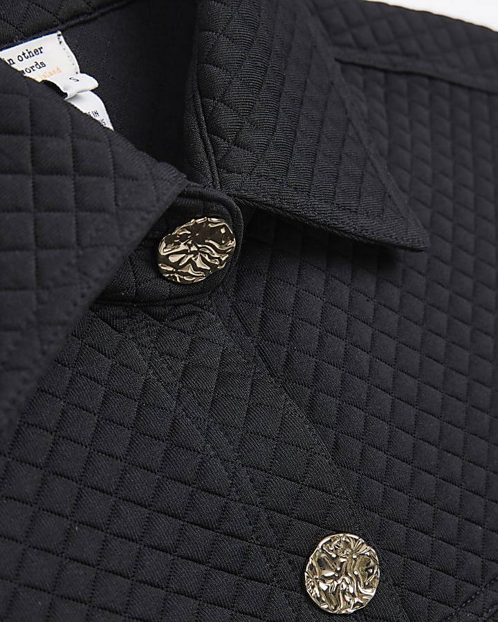 Black quilted longline shacket