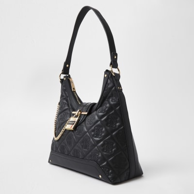 Black quilted padlock slouch handbag | River Island