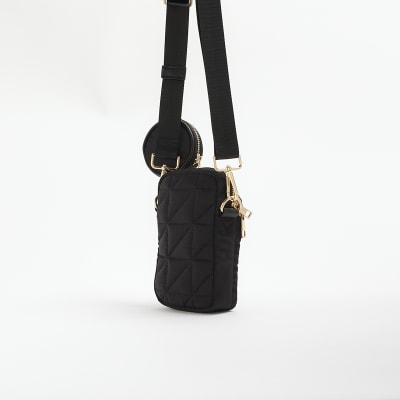 Black quilted phone cross body bag River Island