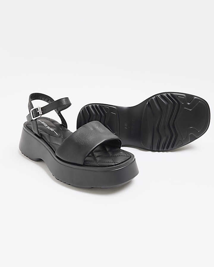 Black quilted platform sandals