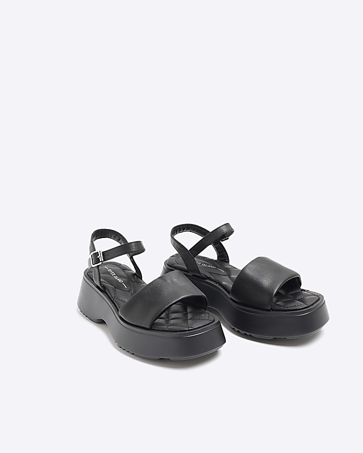 Black quilted platform sandals