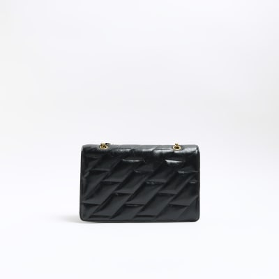 Black quilted shoulder bag River Island