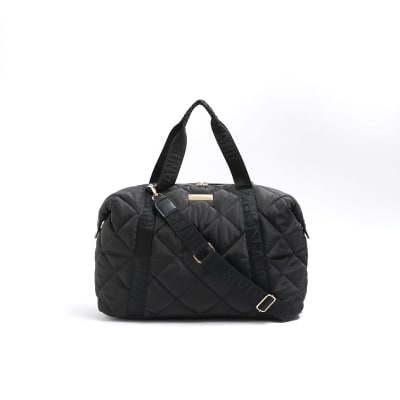 Black quilted webbing travel bag River Island