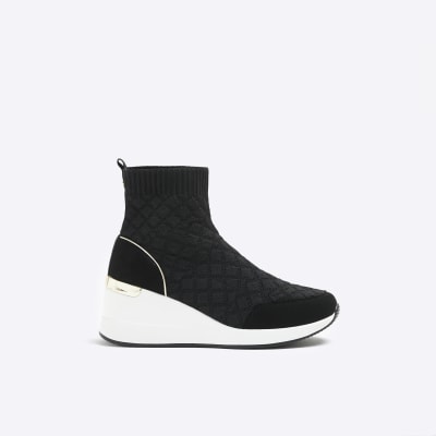Black quilted wedge trainers | River Island
