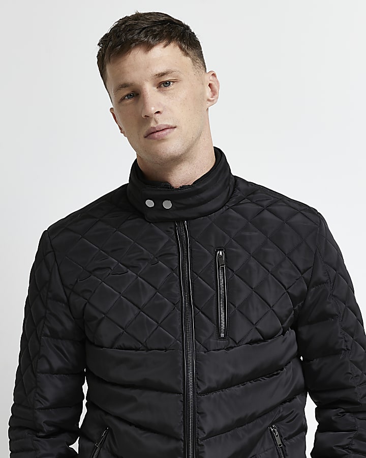 Black quilted zip through puffer jacket