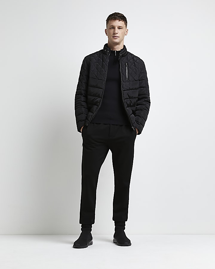 Black quilted zip through puffer jacket