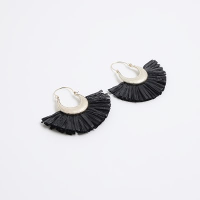 Gold earrings with hot sale black fringe