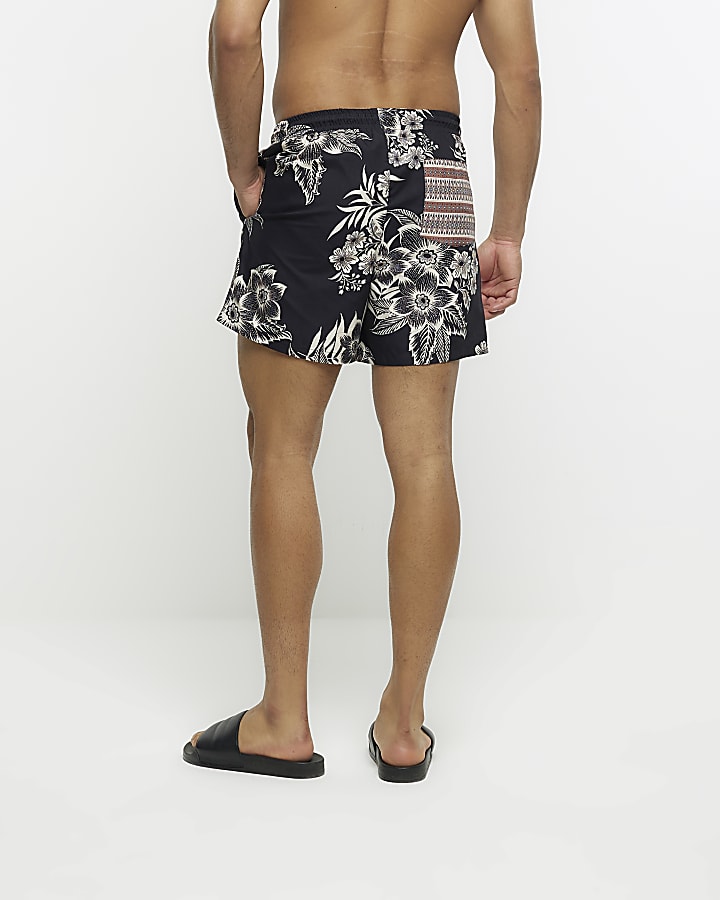 Black regular fit floral swim shorts