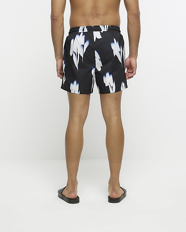 Black regular fit floral swim shorts