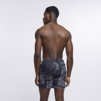 Black regular fit paisley swim shorts