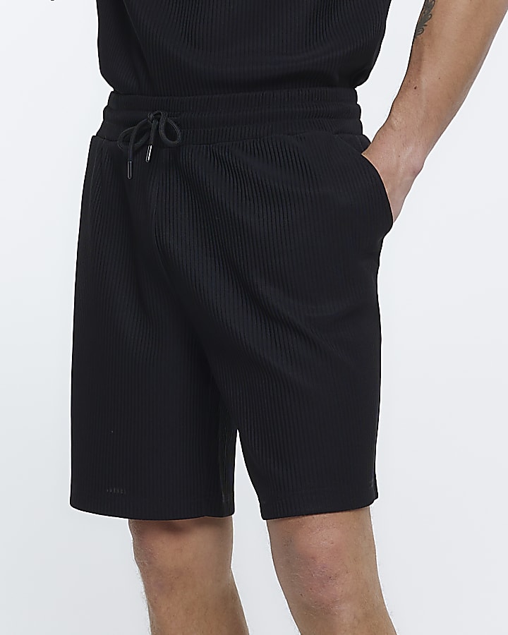 Black regular fit plisse shorts