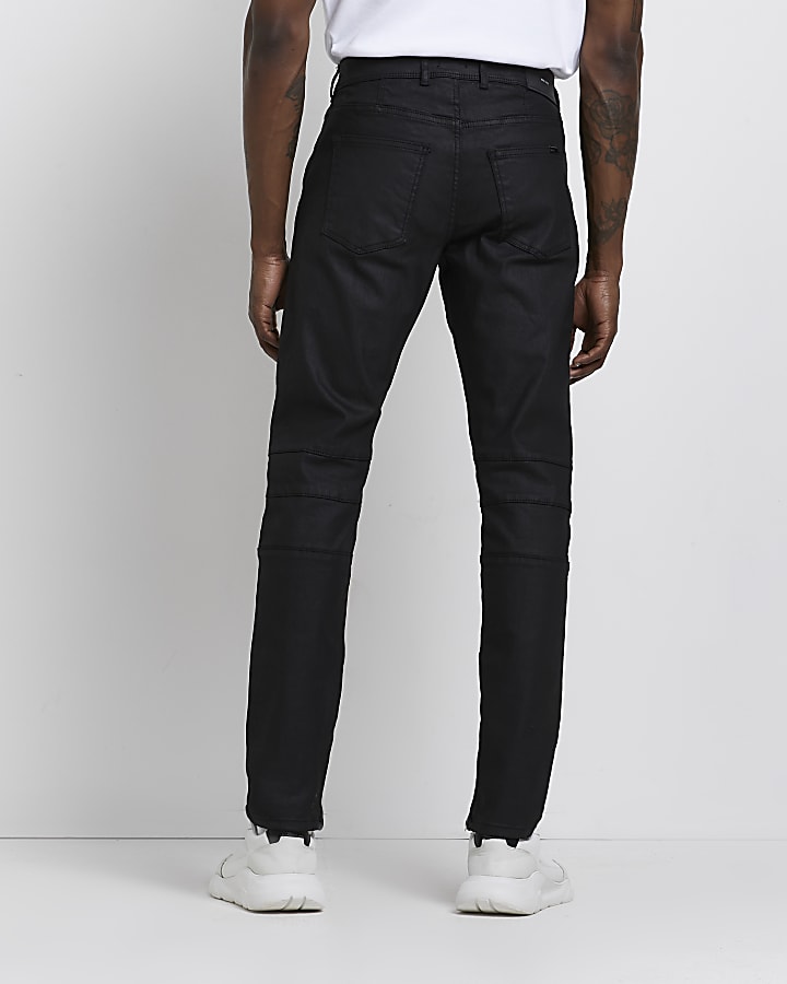 Black relaxed skinny fit coated jeans
