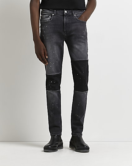 Black relaxed skinny fit patchwork jeans