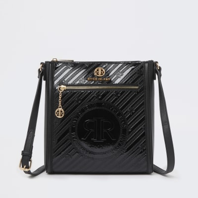Black RI branded embossed messenger bag River Island