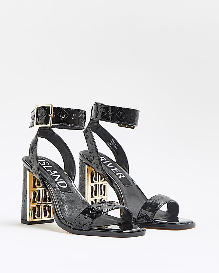 Black RI monogram embossed heeled sandals