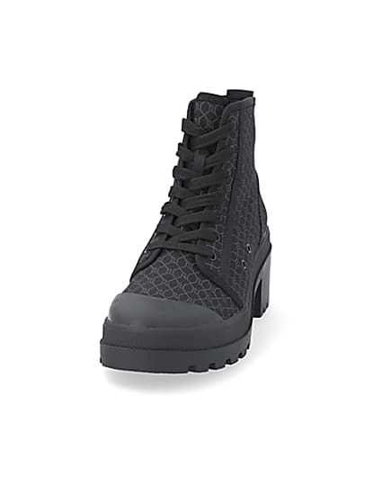 360 degree animation of product Black RI monogram lace up boots frame-22
