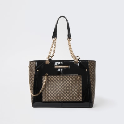 black patent ri embossed purse