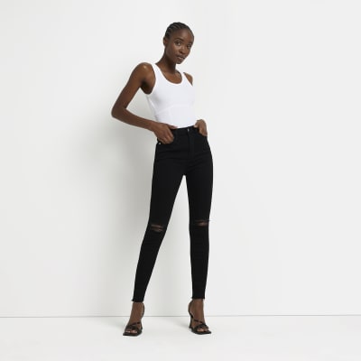 Girls black skinny ripped 2024 jeans