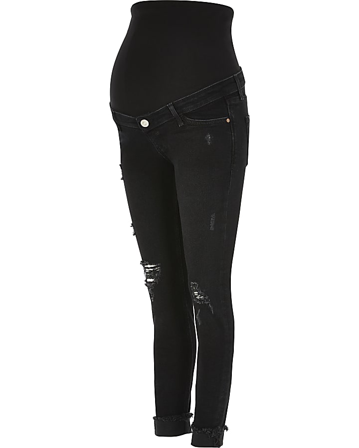 Black ripped mid rise maternity skinny jeans