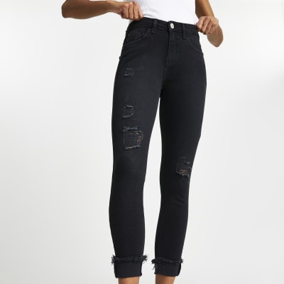 mid rise black ripped skinny jeans