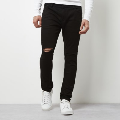 Black ripped Sid skinny jeans