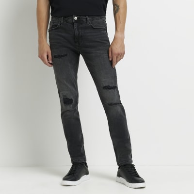 Black ripped Sid skinny jeans | River Island