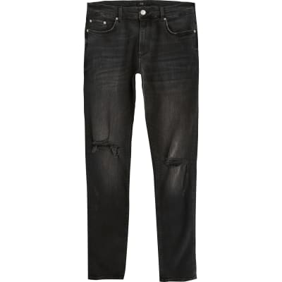 black ripped skinny jeans river island