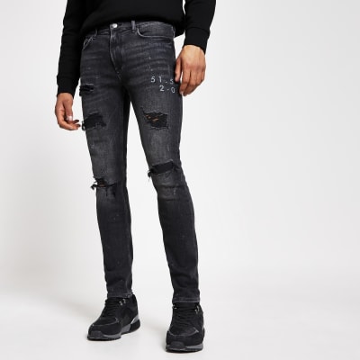 black ripped super skinny jeans