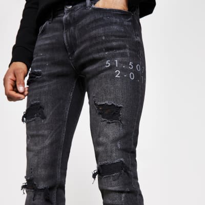 black ripped super skinny jeans