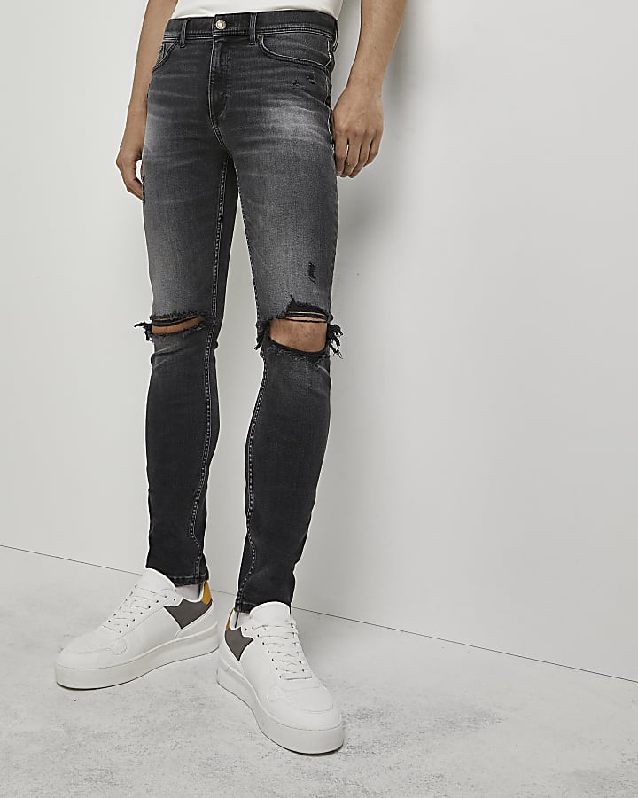 Black ripped spray on super skinny fit jeans