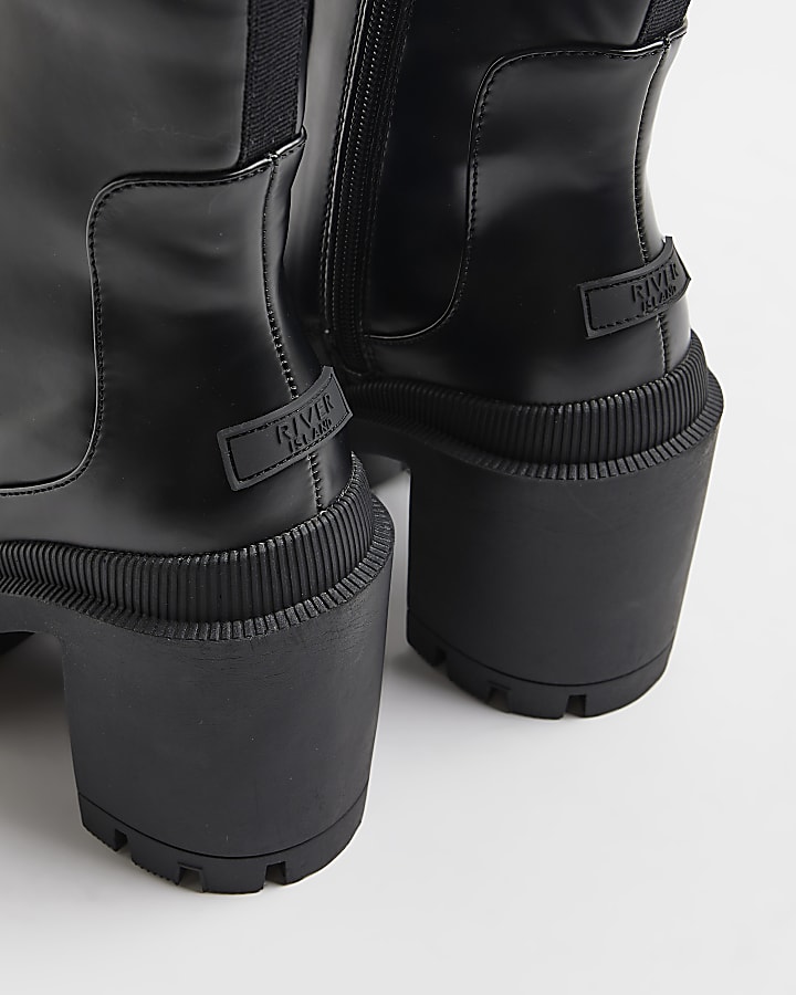 Black rubber heeled ankle boots
