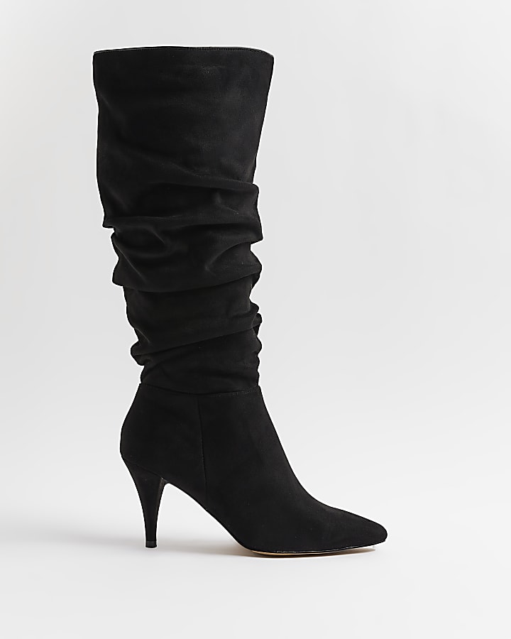 Black ruched knee high heeled boots