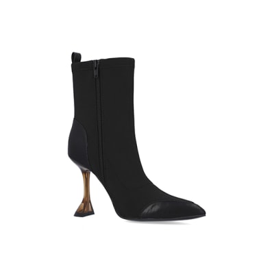 360 degree animation of product Black scuba flared heeled ankle boots frame-17