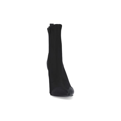 360 degree animation of product Black scuba flared heeled ankle boots frame-20