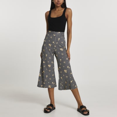 Black shirred waist gingham culotte trousers
