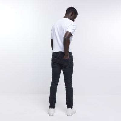 Black skinny fit faded ripped jeans | River Island