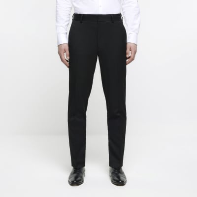 Black skinny fit herringbone suit trousers | River Island