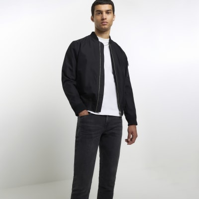 Black skinny fit jeans | River Island