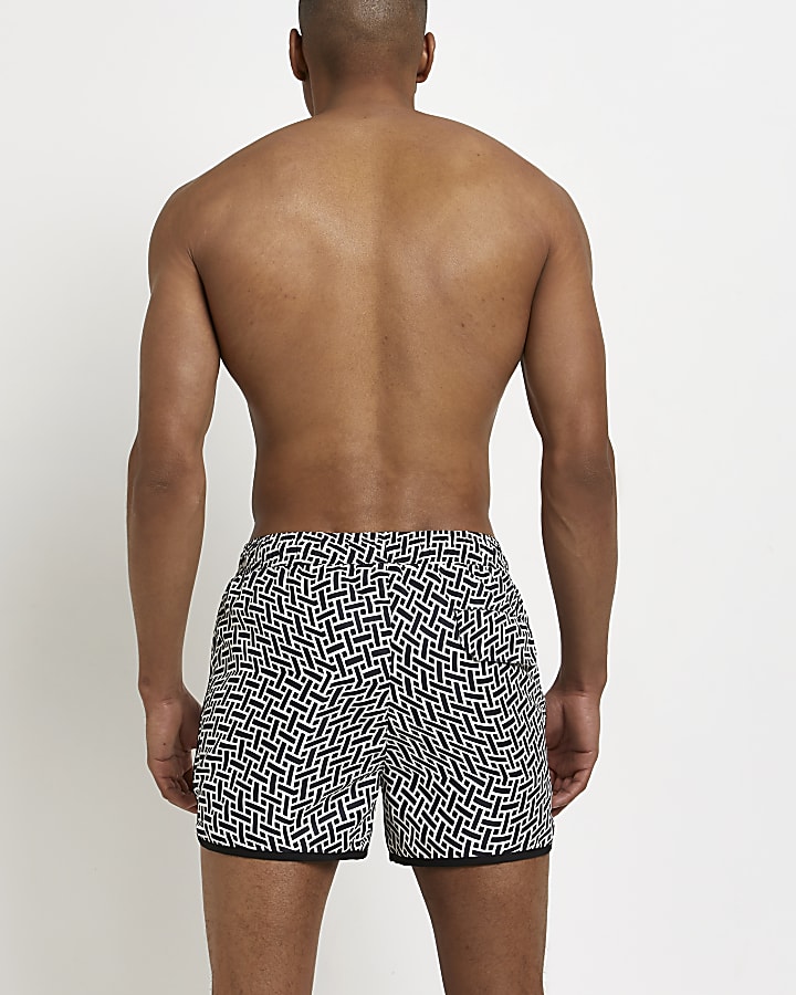 Black skinny fit print RI swim shorts