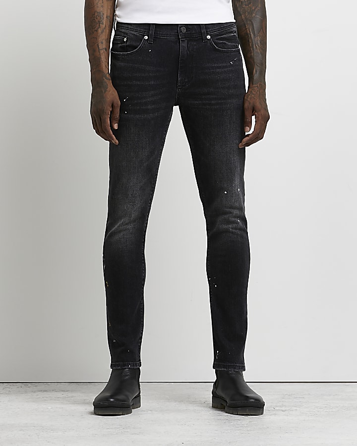 Black skinny paint splatter jeans