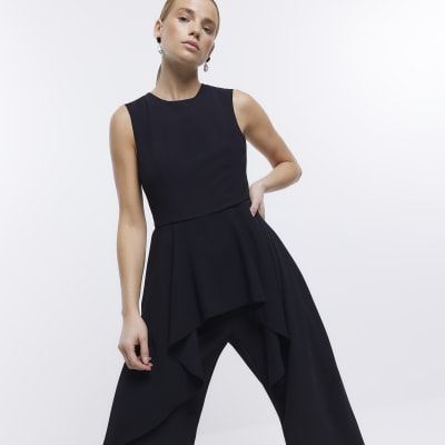 Black sleeveless ruffle jumpsuit | River Island