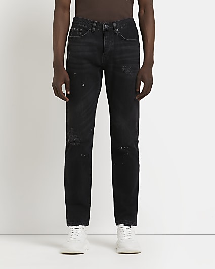 Black slim fit ripped bleach splat jeans