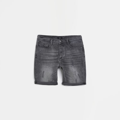 Black ripped shorts river island sale