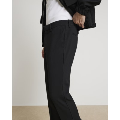 Black slim fit waffle textured trousers River Island
