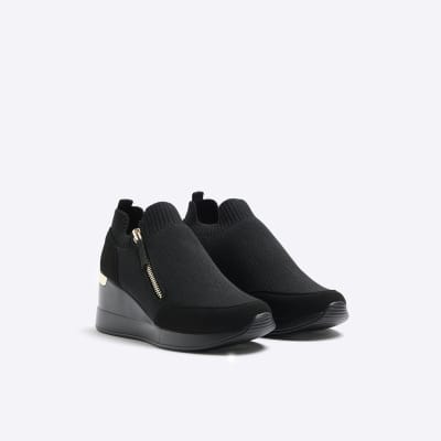 Black slip on wedge trainers | River Island