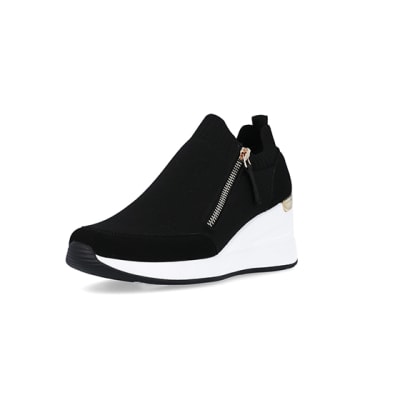 Black slip on wedge trainers | River Island